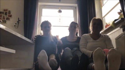 Mother And Two Daughters Display Off Their Socks And Barefeet To You Losers